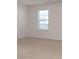 Empty bedroom with neutral wall paint and carpeted floors at 3933 Meadow Green Dr, Charlotte, NC 28269