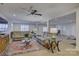 Large basement with neutral walls and floors, and comfortable seating with view of gym equipment at 45528 Misty Bluff Dr, Charlotte, NC 28278