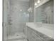 Spa-like bathroom with walk-in shower and built-in bench at 45528 Misty Bluff Dr, Charlotte, NC 28278