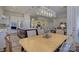 Bright kitchen with an adjacent dining area and hardwood floors at 45528 Misty Bluff Dr, Charlotte, NC 28278