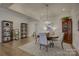 Bright dining room with hardwood floors and stylish furnishings at 45528 Misty Bluff Dr, Charlotte, NC 28278
