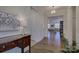 Bright and spacious entryway with hardwood floors and elegant decor at 45528 Misty Bluff Dr, Charlotte, NC 28278