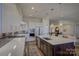 Modern kitchen with stainless steel appliances and ample counter space at 45528 Misty Bluff Dr, Charlotte, NC 28278
