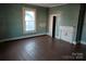 Bright bedroom with hardwood floors and fireplace at 507 Park Ave, Salisbury, NC 28144