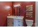 Updated bathroom with white vanity, quartz countertop, and stylish mirror at 5601 Fairview Rd # 22, Charlotte, NC 28209