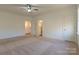 Spacious bedroom with neutral carpeting and ensuite bathroom access at 5601 Fairview Rd # 22, Charlotte, NC 28209