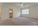 Bright bedroom with neutral walls, carpeting, and ceiling fan at 5601 Fairview Rd # 22, Charlotte, NC 28209