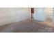 Spacious bedroom with neutral walls, carpeting, and ensuite bathroom at 5601 Fairview Rd # 22, Charlotte, NC 28209