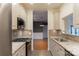 Modern kitchen with granite countertops and stainless steel appliances at 5601 Fairview Rd # 22, Charlotte, NC 28209