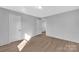 Spacious bedroom with hardwood floors and an open doorway to another room at 611 Clarinda St, Rock Hill, SC 29730
