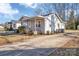 View of the house's side, showing driveway and additional exterior features at 611 Clarinda St, Rock Hill, SC 29730