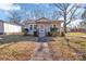 House exterior showcasing gray siding, front porch, and landscaped yard at 611 Clarinda St, Rock Hill, SC 29730