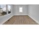 Bright living room featuring light gray walls and wood-look flooring at 611 Clarinda St, Rock Hill, SC 29730