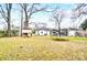Large backyard with trampoline and playset at 621 Flint St, Rock Hill, SC 29730