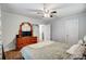 Bright bedroom with wood floors, ceiling fan, and dresser at 621 Flint St, Rock Hill, SC 29730