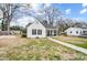 Front yard view of a charming white house at 621 Flint St, Rock Hill, SC 29730