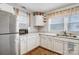 White corner kitchen with stainless steel appliances at 621 Flint St, Rock Hill, SC 29730