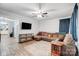 Spacious living room with L-shaped sofa and hardwood floors at 621 Flint St, Rock Hill, SC 29730