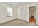 Bright bedroom featuring neutral walls and carpet flooring at 6558 Regatta Ln, Charlotte, NC 28227