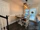 Cozy kitchen dining area with table and chairs, leading to a deck at 8020 Long House Ln, Fort Mill, SC 29707