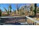 View of backyard from deck, featuring a large grassy area at 830 Richard Ave, Kannapolis, NC 28081