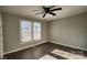 Bright bedroom with ceiling fan and hardwood floors at 830 Richard Ave, Kannapolis, NC 28081