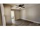 Simple bedroom with ceiling fan and wood-look floors at 830 Richard Ave, Kannapolis, NC 28081