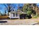 Charming house with gray siding and a gravel driveway at 830 Richard Ave, Kannapolis, NC 28081