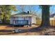 Rear view of house, showcasing deck and yard at 830 Richard Ave, Kannapolis, NC 28081