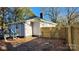 Side view of house with deck and fenced yard at 830 Richard Ave, Kannapolis, NC 28081