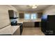 Modern kitchen with gray cabinets and marble countertops at 830 Richard Ave, Kannapolis, NC 28081