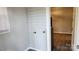 Small laundry area with hookups and storage at 830 Richard Ave, Kannapolis, NC 28081