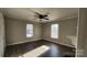 Spacious living room with hardwood floors and large windows at 830 Richard Ave, Kannapolis, NC 28081