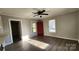 Living room featuring hardwood floors and a red front door at 830 Richard Ave, Kannapolis, NC 28081