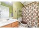 Simple bathroom with shower/tub combo and shelves at 9814 Dauphine Dr, Charlotte, NC 28216