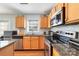 Kitchen with stainless steel appliances and granite countertops at 9814 Dauphine Dr, Charlotte, NC 28216