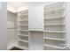 Large walk-in closet with custom shelving and hanging rods at 100 Linestowe Dr, Belmont, NC 28012