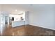 Open concept kitchen and dining area with hardwood floors at 100 Linestowe Dr, Belmont, NC 28012