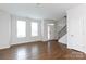 Spacious living room with hardwood floors and natural light at 100 Linestowe Dr, Belmont, NC 28012