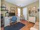 Home office with a desk, chair, and built-in shelving at 10321 Shelter Rock Ct, Charlotte, NC 28214