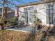 Cozy patio with table, chairs, and umbrella, perfect for outdoor dining at 10321 Shelter Rock Ct, Charlotte, NC 28214