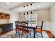 Elegant dining room featuring stylish black chairs and rustic wood beam ceilings at 109 Chanticleer Ct, Charlotte, NC 28214