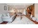 Spacious living room with exposed beams, brick fireplace, and comfortable seating at 109 Chanticleer Ct, Charlotte, NC 28214