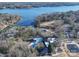 Aerial view of community with lakefront property and clubhouse at 12 Woodvine Ln, Clover, SC 29710