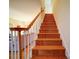 Wooden staircase leading to the upper level at 12 Woodvine Ln, Clover, SC 29710