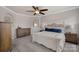 Main bedroom with a rustic white bed frame and blue accents at 130 Fellspoint Rd, Mooresville, NC 28115