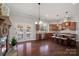 Spacious kitchen with island, stainless steel appliances, and hardwood floors at 130 Fellspoint Rd, Mooresville, NC 28115