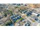 Aerial view of townhouses with city skyline in the background at 1304 Queen Lyon Ct, Charlotte, NC 28205
