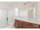 Bathroom with double vanity and walk-in shower at 1304 Queen Lyon Ct, Charlotte, NC 28205