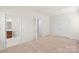 Bedroom with access to bathroom and stairs at 1304 Queen Lyon Ct, Charlotte, NC 28205